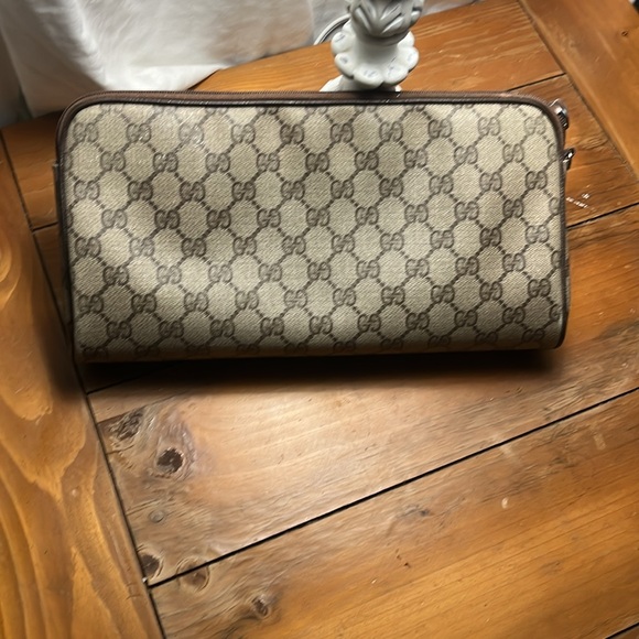 Gently used over size larger hand clutch. One zipper inside. No tips no stains. - Picture 2 of 4